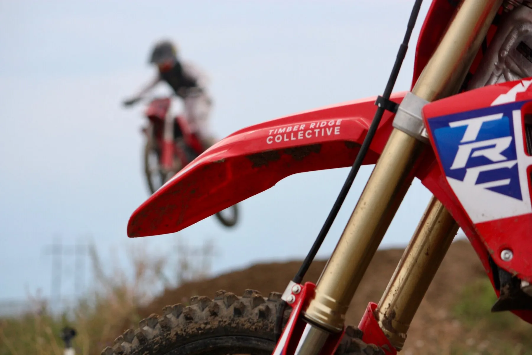 A rider in the air against a big Montana sky